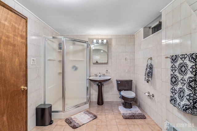 34 Brookside Ave, Old Bridge, NJ 08857 - bathroom featuring a shower stall, tile patterned flooring, toilet, tile walls, and crown molding