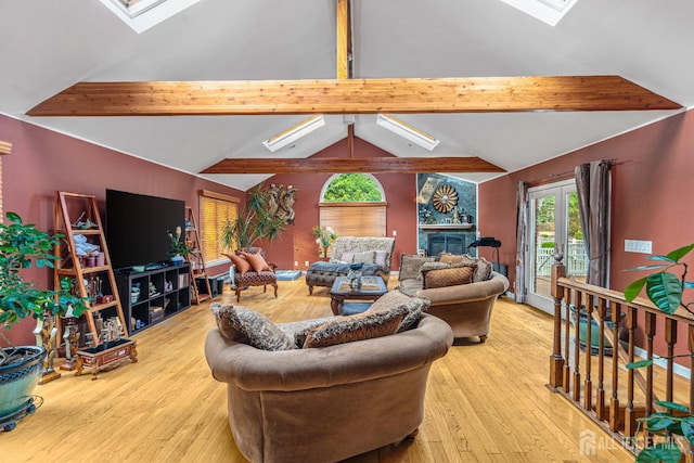 34 Brookside Ave, Old Bridge, NJ 08857 - living area featuring a skylight, wood finished floors, and a fireplace