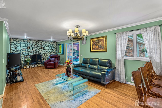 34 Brookside Ave, Old Bridge, NJ 08857 - living area featuring ornamental molding, wood finished floors, a chandelier, a fireplace, and baseboards