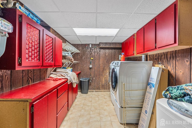 34 Brookside Ave, Old Bridge, NJ 08857 - laundry area featuring cabinet space, wood walls, and washer and dryer