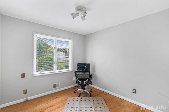 34 Brookside Ave, Old Bridge, NJ 08857 - unfurnished room featuring light wood-type flooring, baseboards, and an office area