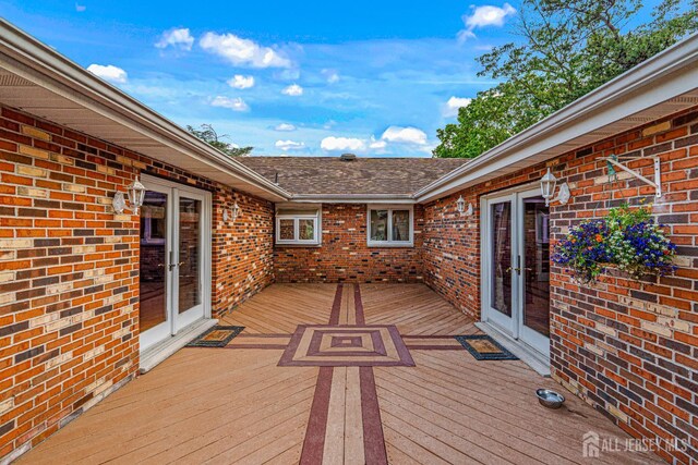 34 Brookside Ave, Old Bridge, NJ 08857 - wooden terrace with french doors
