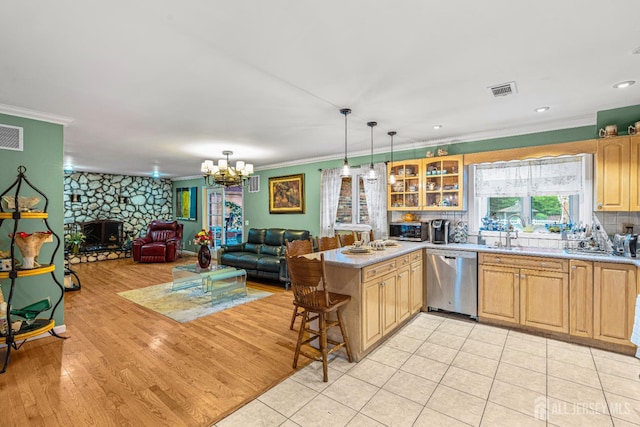 34 Brookside Ave, Old Bridge, NJ 08857 - kitchen featuring dishwasher, crown molding, light countertops, open floor plan, and glass insert cabinets