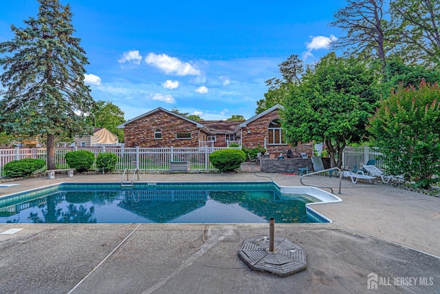 34 Brookside Ave, Old Bridge, NJ 08857 - view of swimming pool with a patio area