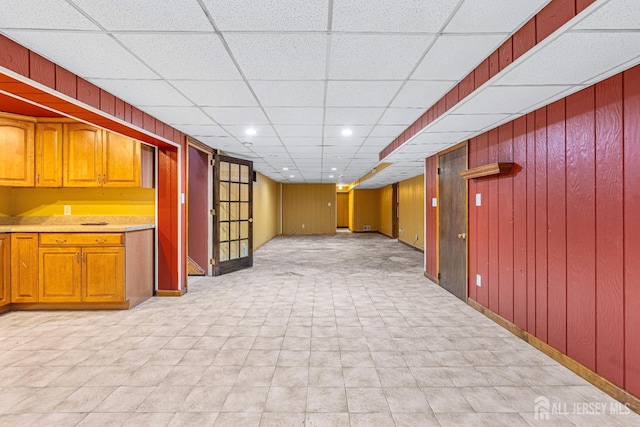 34 Brookside Ave, Old Bridge, NJ 08857 - finished basement with wooden walls, a drop ceiling, baseboards, and recessed lighting