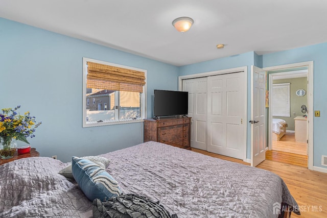 34 Brookside Ave, Old Bridge, NJ 08857 - bedroom featuring wood finished floors, a closet, and baseboards