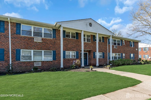 32 Woodedge Ave Unit 5, Edison, NJ 08817 - view of front facade with a front yard and brick siding