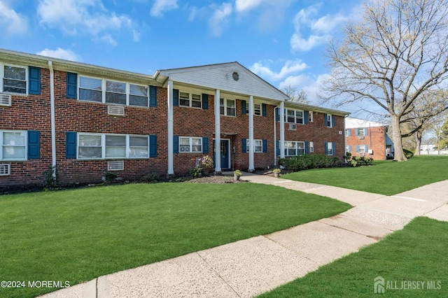 32 Woodedge Ave Unit 5, Edison, NJ 08817 - view of front of house featuring a front lawn and brick siding