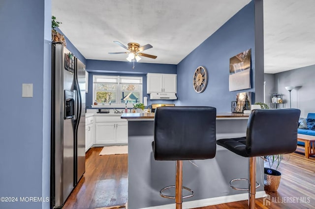 32 Woodedge Ave Unit 5, Edison, NJ 08817 - kitchen with stainless steel fridge with ice dispenser, dark wood-style floors, and white cabinets