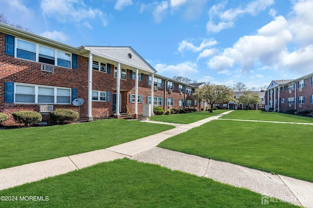 32 Woodedge Ave Unit 5, Edison, NJ 08817 - surrounding community with a residential view and a lawn