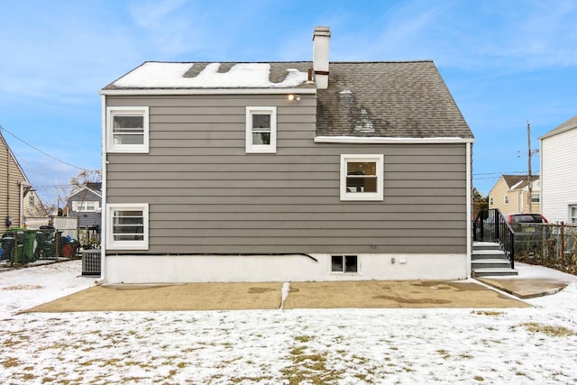 view of snow covered property