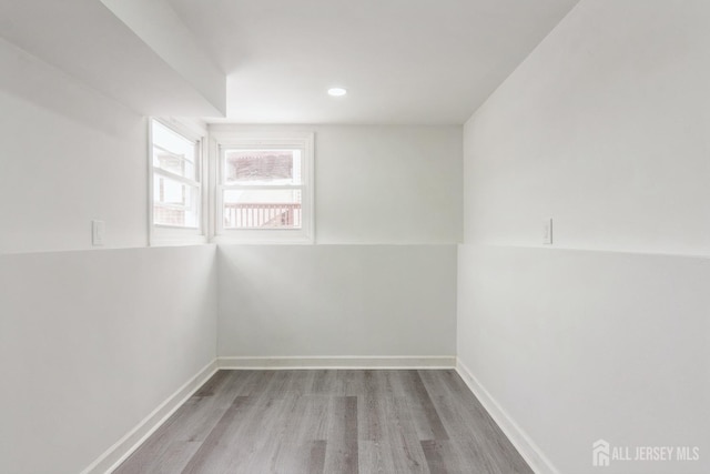 unfurnished room with light hardwood / wood-style flooring