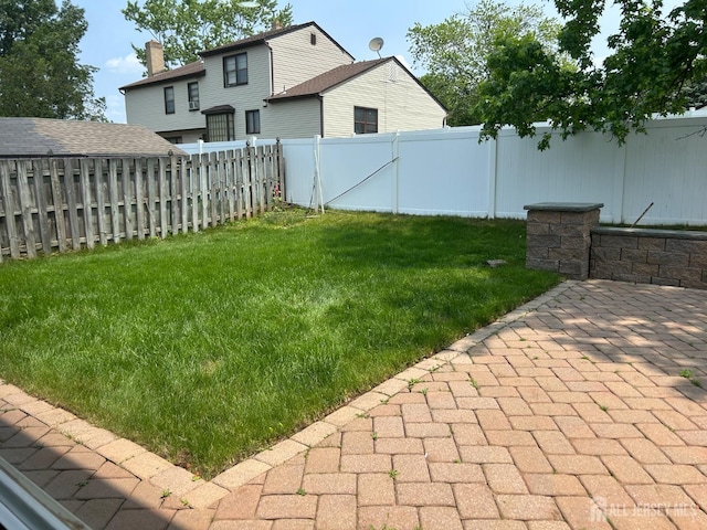 6 Quaker St, Edison, NJ 08820 - fenced backyard with a patio area
