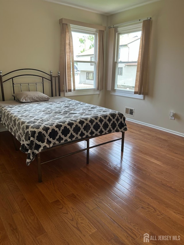 6 Quaker St, Edison, NJ 08820 - bedroom with hardwood / wood-style floors and baseboards