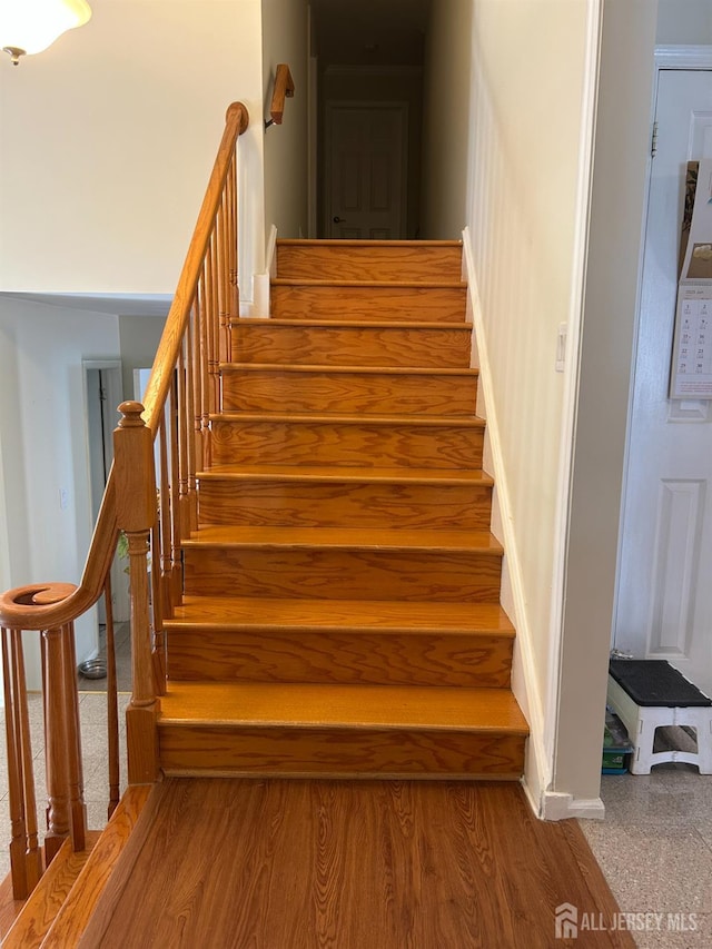 6 Quaker St, Edison, NJ 08820 - stairway featuring baseboards and wood finished floors