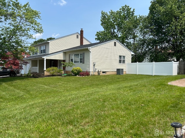 6 Quaker St, Edison, NJ 08820 - rear view of property with a chimney