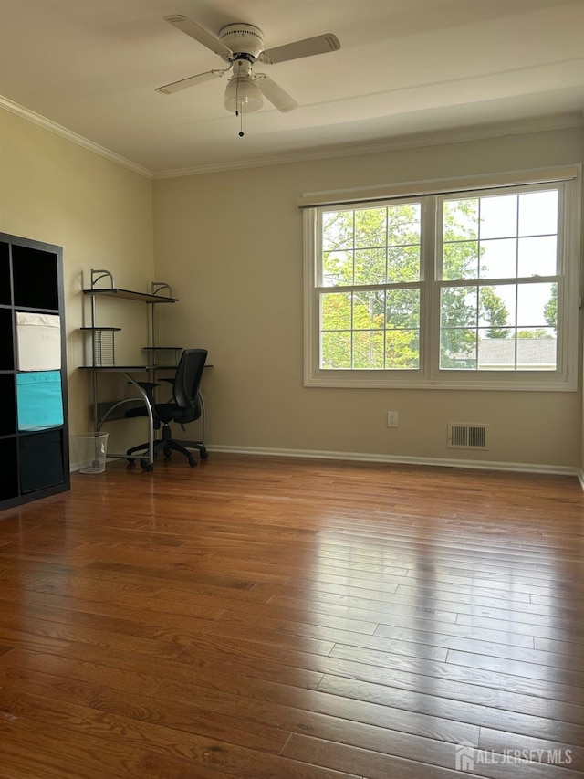 6 Quaker St, Edison, NJ 08820 - unfurnished office featuring ornamental molding, healthy amount of natural light, wood finished floors, and ceiling fan