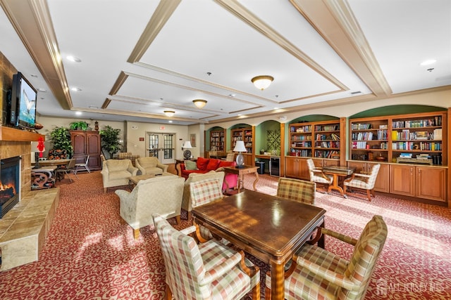 dining space featuring a tile fireplace and carpet flooring