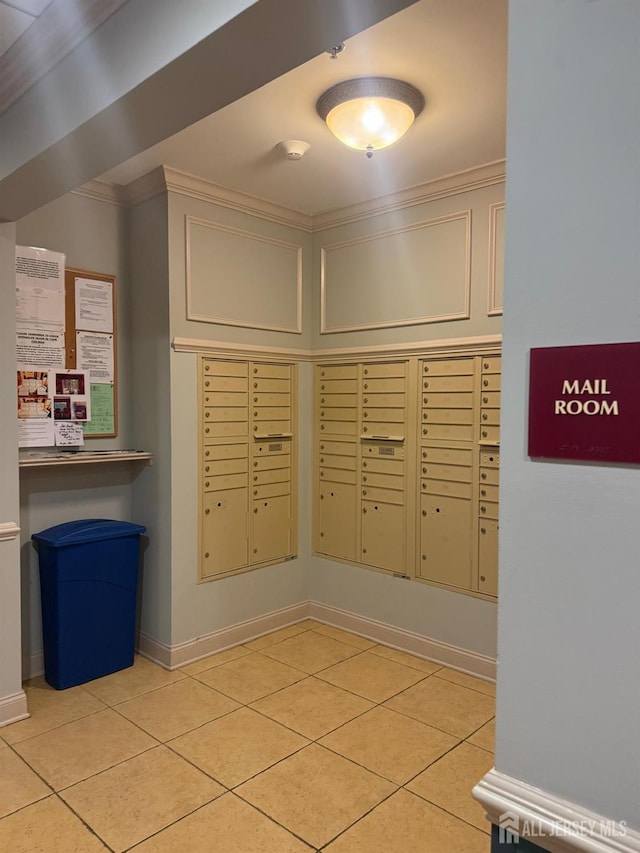 view of community featuring mail area and crown molding