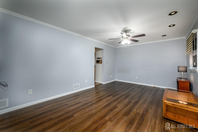 unfurnished living room with ceiling fan, dark hardwood / wood-style flooring, and crown molding