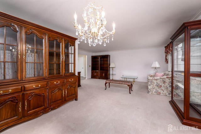 sitting room featuring light colored carpet, a notable chandelier, and ornamental molding