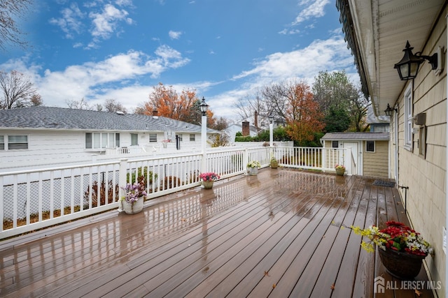 deck featuring a storage shed