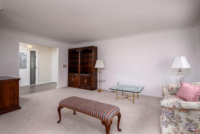 living room with carpet and ornamental molding