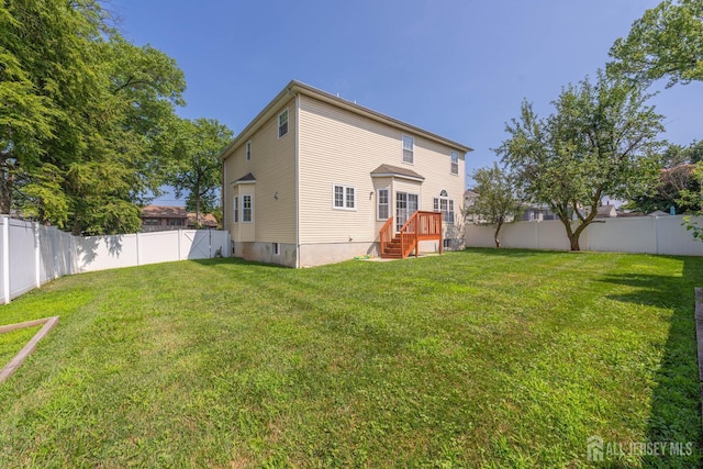 841 Harrell Ave, Woodbridge Proper, NJ 07095 - back of house with a fenced backyard