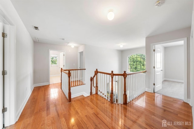 841 Harrell Ave, Woodbridge Proper, NJ 07095 - hall with an upstairs landing, light wood-style flooring, and plenty of natural light