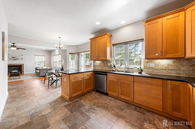 841 Harrell Ave, Woodbridge Proper, NJ 07095 - kitchen with tasteful backsplash, a peninsula, recessed lighting, stainless steel dishwasher, and dark stone finish floors