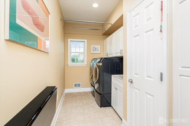 9 Bouvier Ln, South Brunswick, NJ 08816 - washroom with separate washer and dryer, cabinet space, baseboards, light tile patterned floors, and recessed lighting