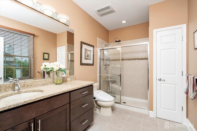 9 Bouvier Ln, South Brunswick, NJ 08816 - full bathroom featuring a stall shower, toilet, vanity, and tile patterned flooring