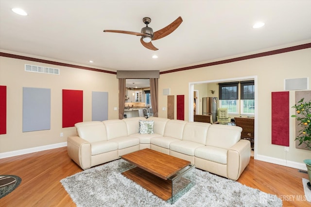 9 Bouvier Ln, South Brunswick, NJ 08816 - living room featuring a ceiling fan, light wood-type flooring, ornamental molding, baseboards, and recessed lighting