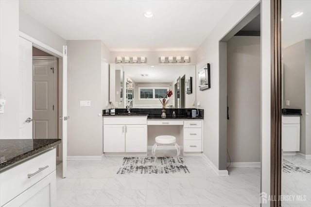 9 Bouvier Ln, South Brunswick, NJ 08816 - bathroom featuring marble finish floors, vanity, baseboards, and recessed lighting