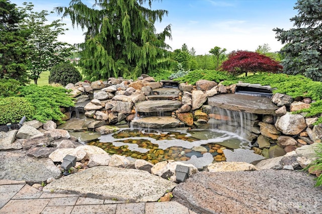 9 Bouvier Ln, South Brunswick, NJ 08816 - view of yard with a garden pond