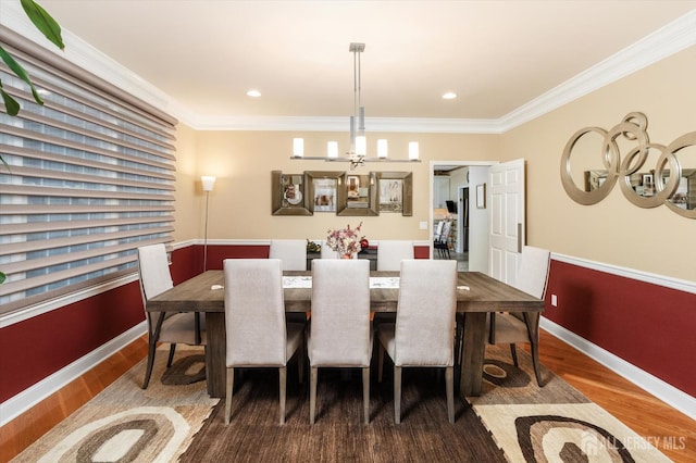 9 Bouvier Ln, South Brunswick, NJ 08816 - dining area featuring wood finished floors, crown molding, baseboards, a chandelier, and recessed lighting