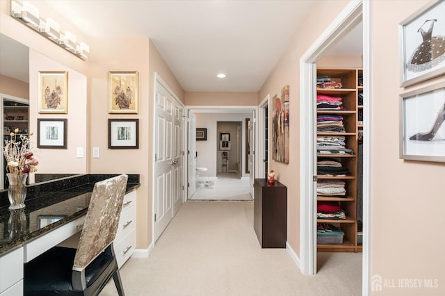 9 Bouvier Ln, South Brunswick, NJ 08816 - hall with light carpet, baseboards, recessed lighting, and a desk