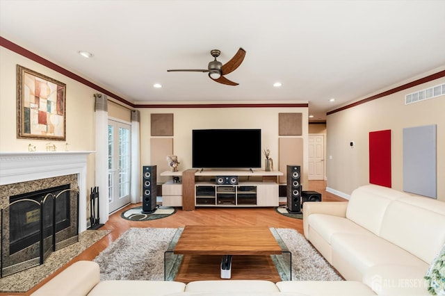 9 Bouvier Ln, South Brunswick, NJ 08816 - living room with ceiling fan, a premium fireplace, ornamental molding, recessed lighting, and wood finished floors