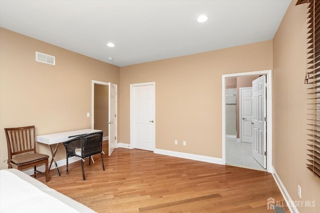 9 Bouvier Ln, South Brunswick, NJ 08816 - bedroom featuring light wood-style floors, baseboards, recessed lighting, and ensuite bath