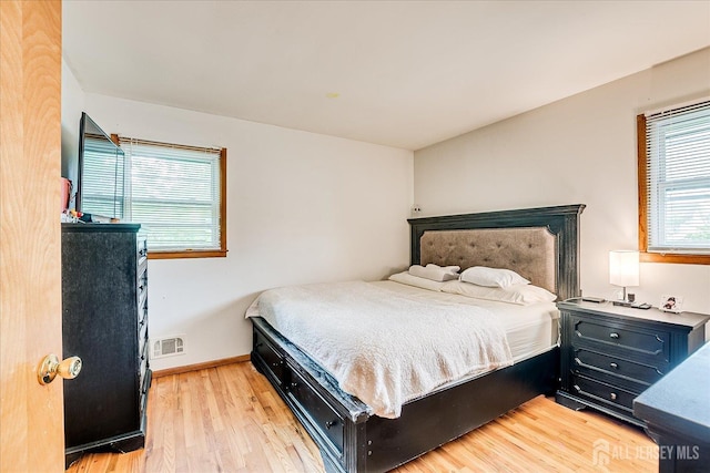 84 Kossuth St, Piscataway, NJ 08854 - bedroom with light wood-style flooring and baseboards