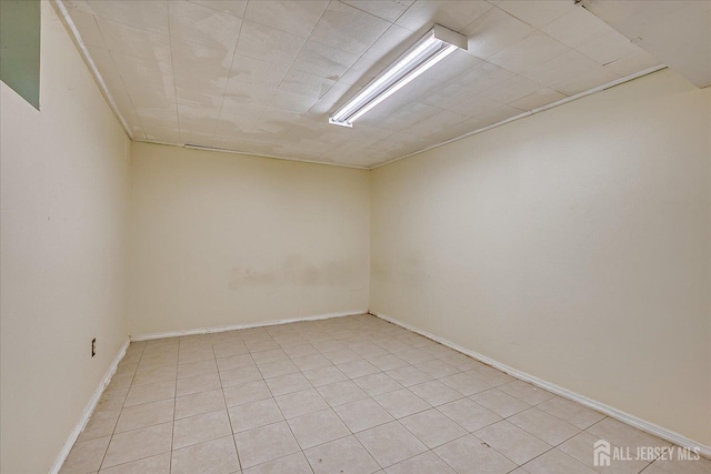 84 Kossuth St, Piscataway, NJ 08854 - unfurnished room featuring light tile patterned floors and baseboards