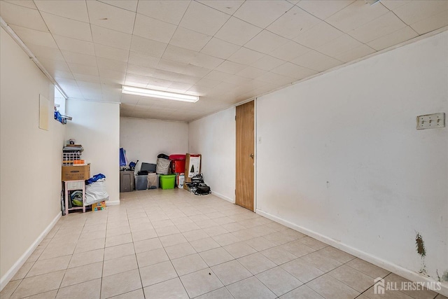 84 Kossuth St, Piscataway, NJ 08854 - finished basement with light tile patterned floors and baseboards