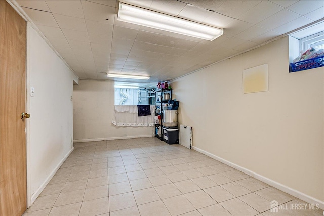 84 Kossuth St, Piscataway, NJ 08854 - below grade area featuring light tile patterned floors and baseboards