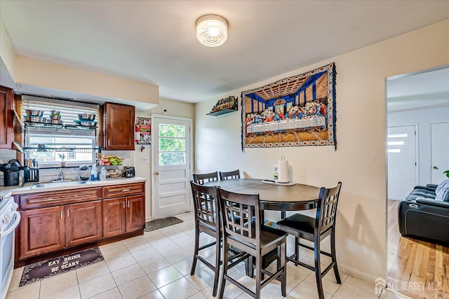84 Kossuth St, Piscataway, NJ 08854 - dining area with light tile patterned floors