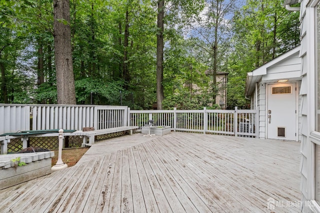 910 Curtis Pl, North Brunswick, NJ 08902 - wooden terrace featuring view of scattered trees