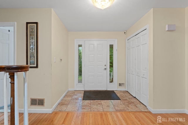 910 Curtis Pl, North Brunswick, NJ 08902 - entrance foyer featuring baseboards and light wood-style flooring
