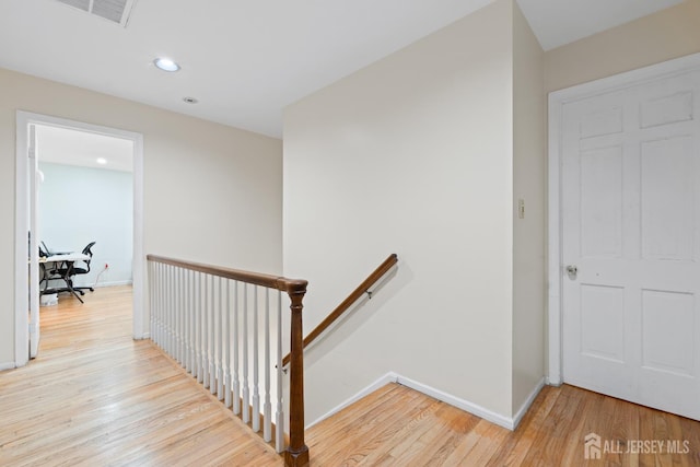 910 Curtis Pl, North Brunswick, NJ 08902 - corridor with an upstairs landing, wood finished floors, and recessed lighting