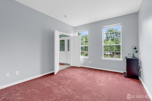 6 Garretson Dr, Franklin, NJ 08823 - carpeted empty room with baseboards