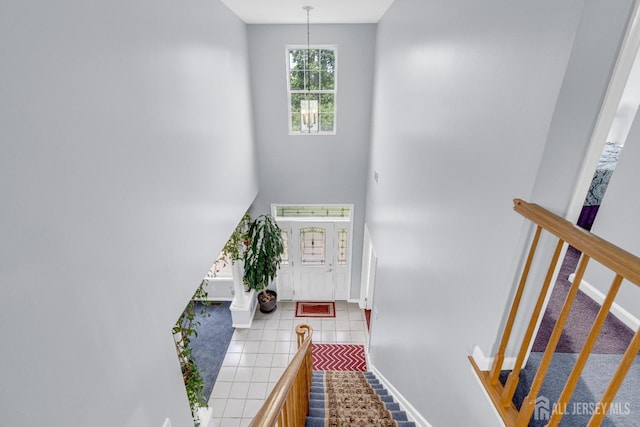 6 Garretson Dr, Franklin, NJ 08823 - entrance foyer with stairs, baseboards, tile patterned flooring, and a high ceiling