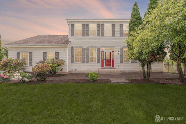 6 Garretson Dr, Franklin, NJ 08823 - colonial-style house featuring a lawn and a patio